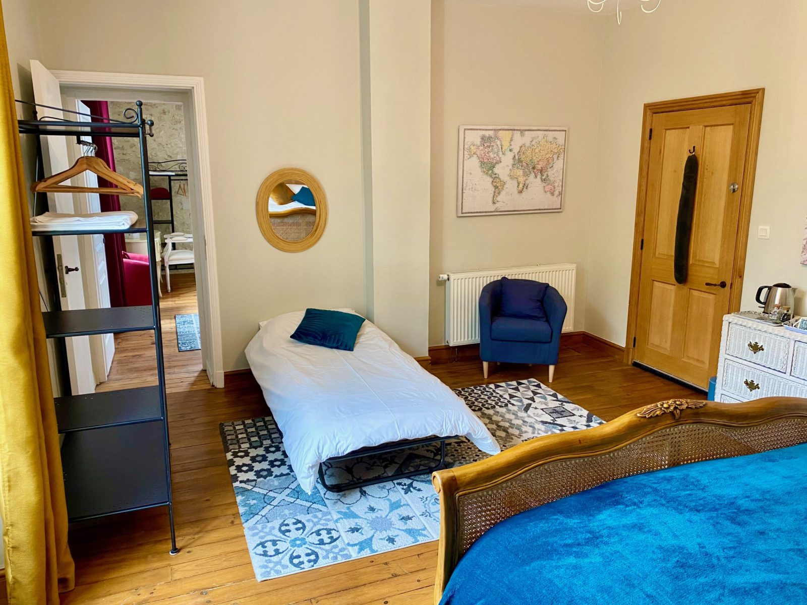 Open interconnecting rooms La Chambre Bleue and La Chambre Rouge with an extra bed for a child